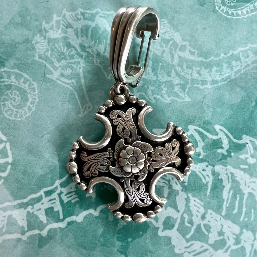 Silver and rhinestone cross pendant